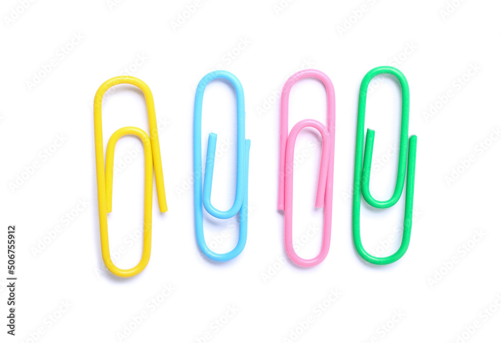 Colorful paper clips on white background, top view