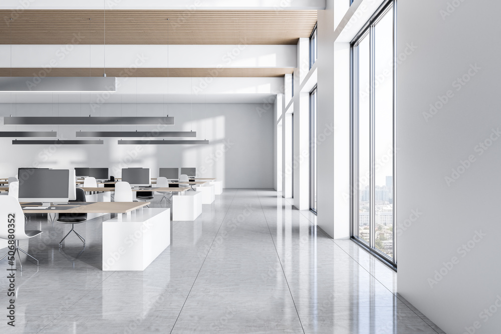 Side view on sunny office with minimalistic light interior design decorated by wooden slatted ceilin