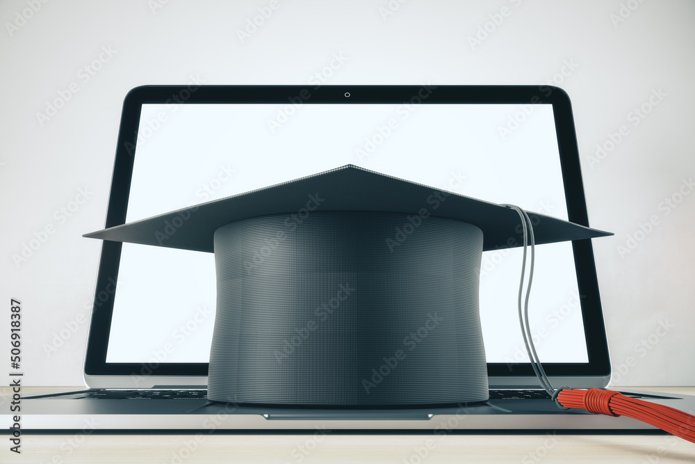 Online education and college university study with black mortarboard hat on laptop keyboard. 3D rend