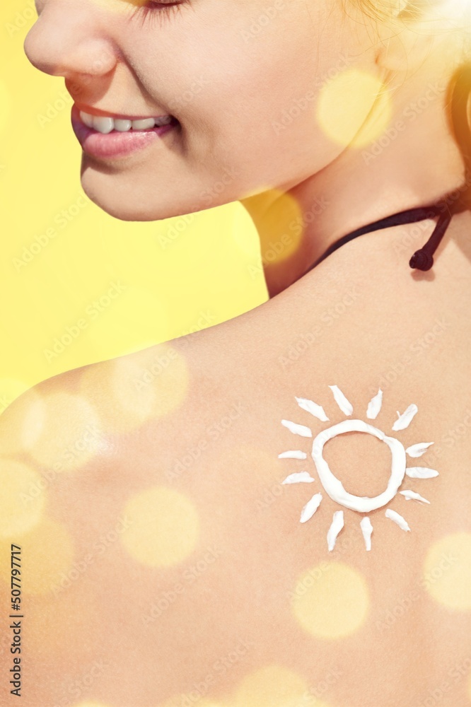 Beauty Woman Applying Sun Cream on Tanned Shoulder. Sun Protection. Sun Cream. Skin and Body Care.