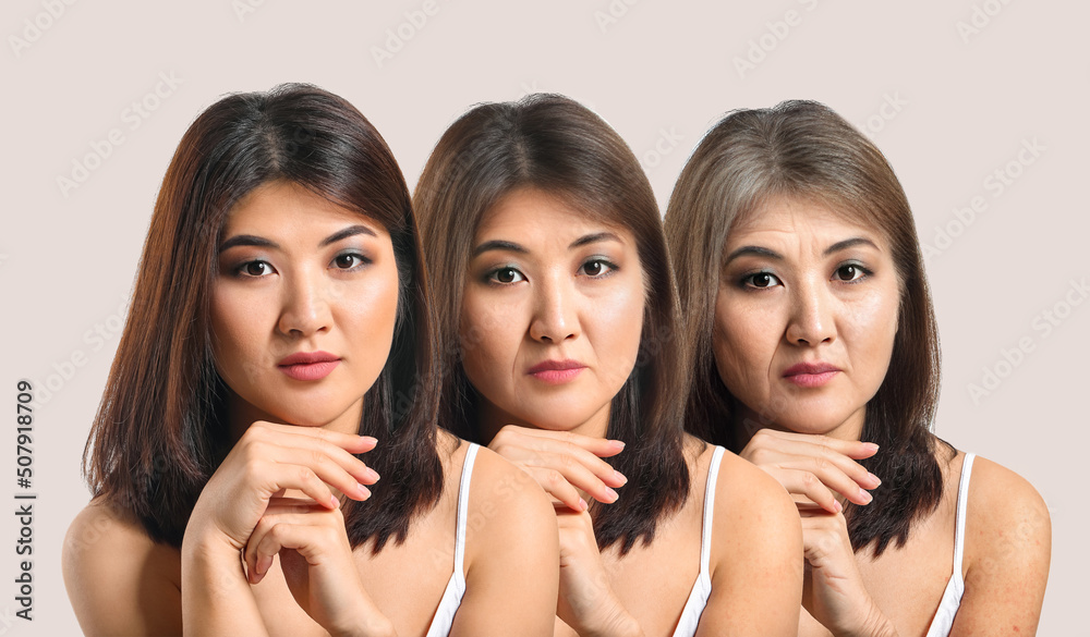 Portrait of young Asian woman on white background