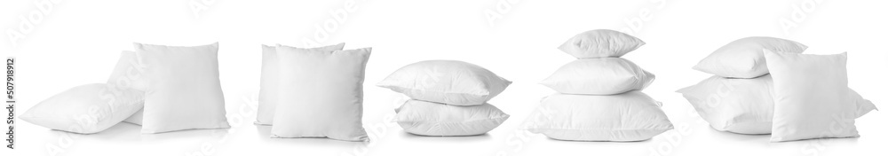 Set of many soft pillows isolated on white