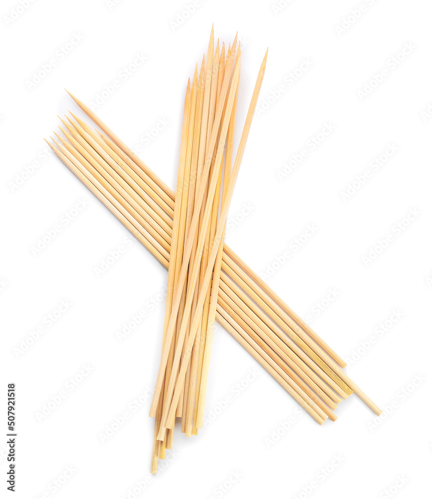 Wooden skewers on white background