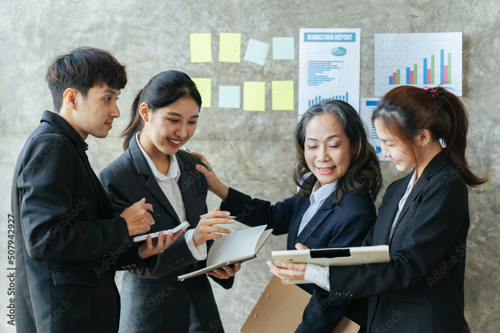 Asian business people working together in the office, Team leader discussing and brainstorming new a