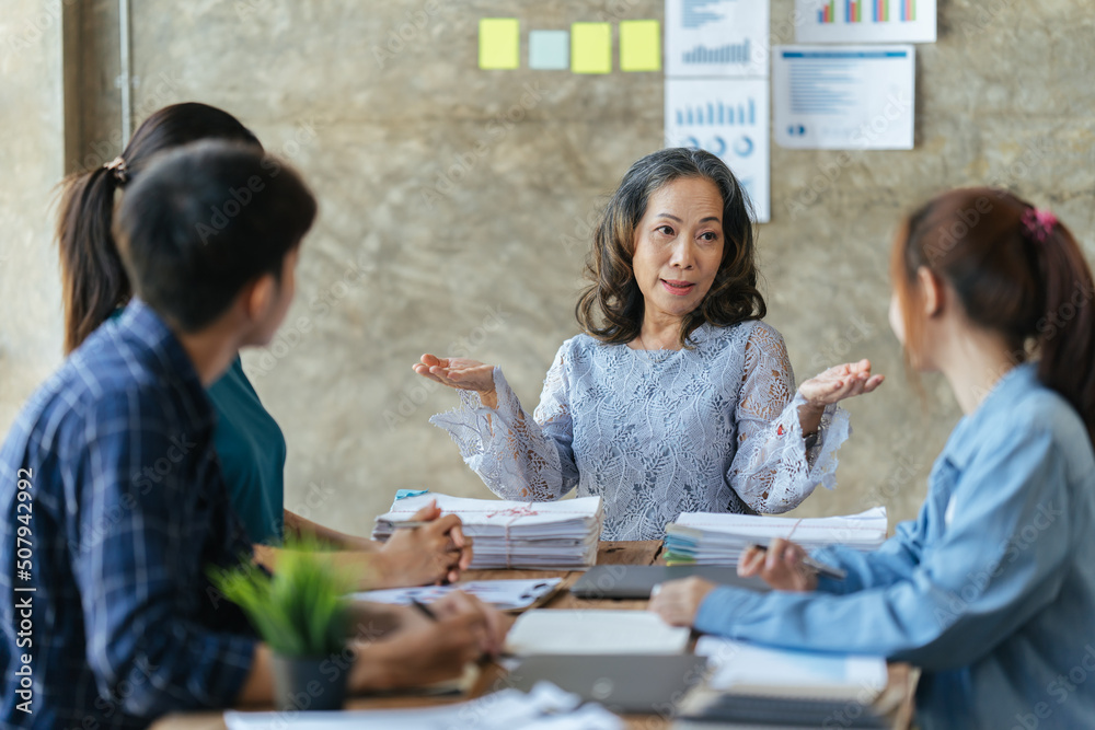 ฺBusinesswoman leaders in office meeting room, Group of a young business people discussing business 