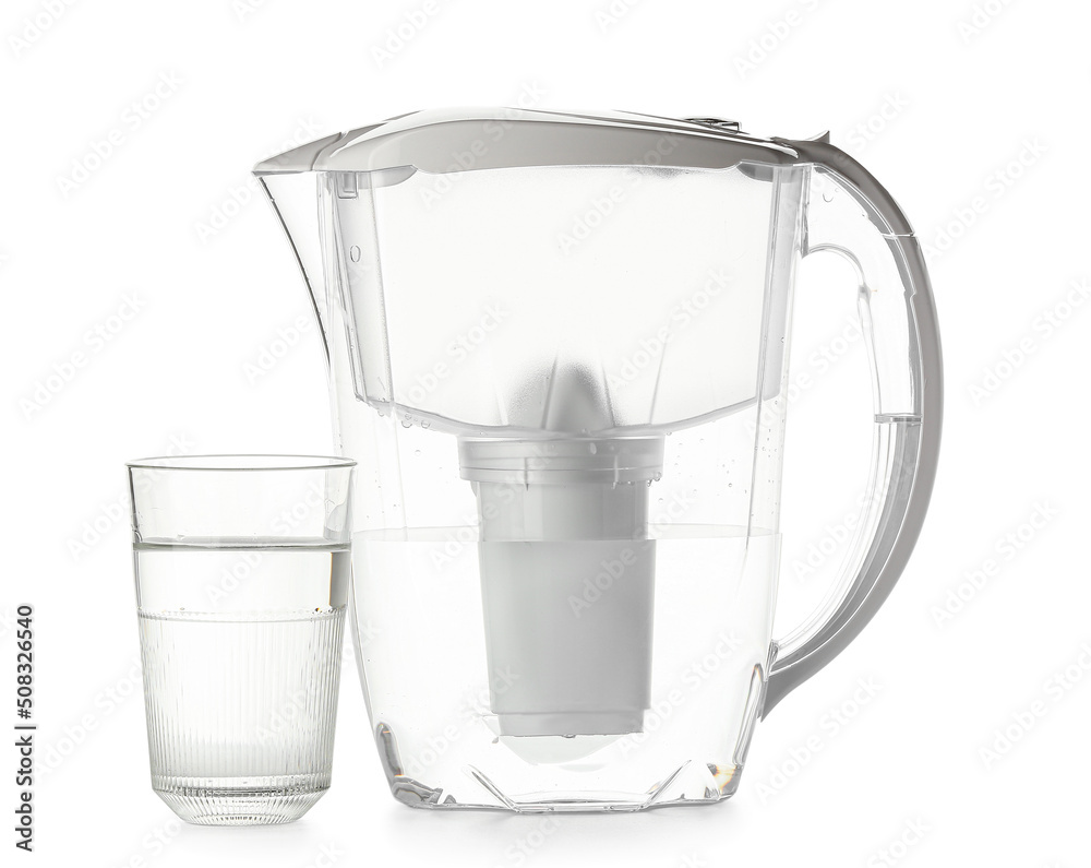 Modern filter jug and glass of water on white background