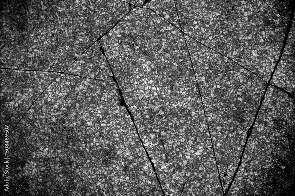 Texture background of cracked old asphalt.