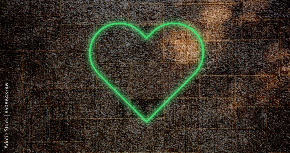 Image of glowing neon heart icon on brick wall