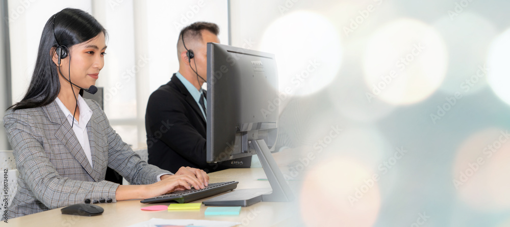 Business people wearing headset working in office to support remote customer or colleague. Call cent