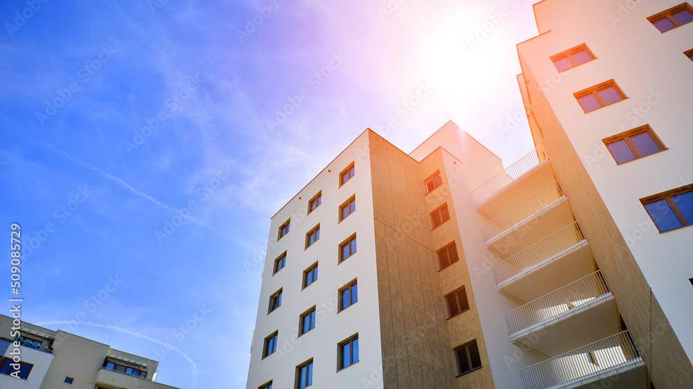 Apartment residential house and home facade architecture and outdoor facilities. Blue sky on the bac