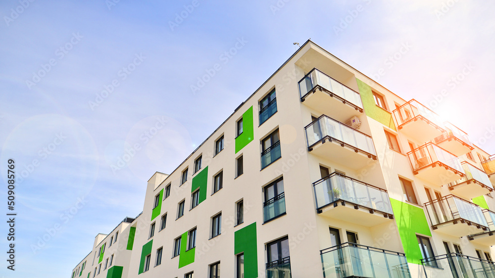 Apartment residential house and home facade architecture and outdoor facilities. Blue sky on the bac