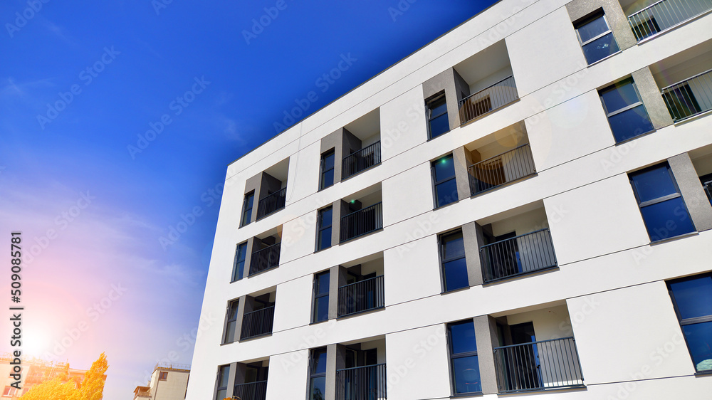 Apartment residential house and home facade architecture and outdoor facilities. Blue sky on the bac