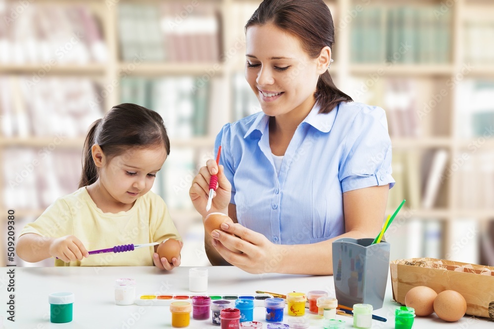 Assessment of kids mental development. Professional woman psychologist watching little child playing