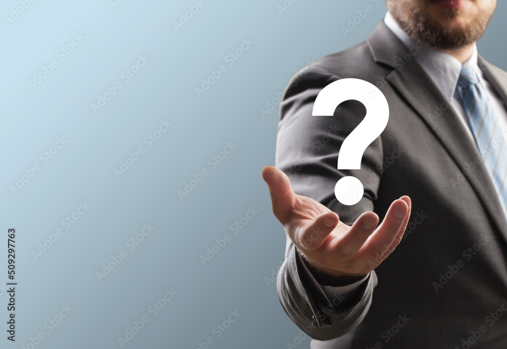 businessman hand holding question mark. concept of Question mark and FAQs, Ask quiestion online