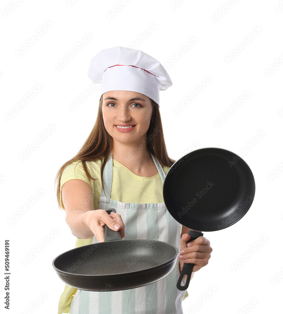 Female chef with frying pans on white background