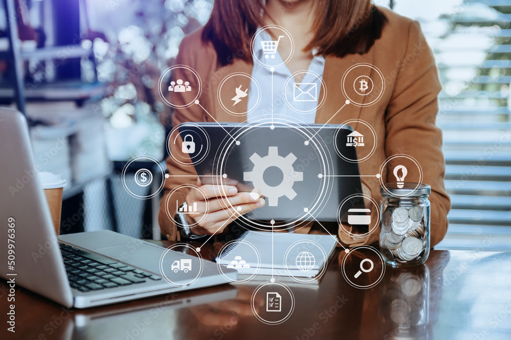 business woman hand working with laptop computer, tablet and smart phone in office with digital mark