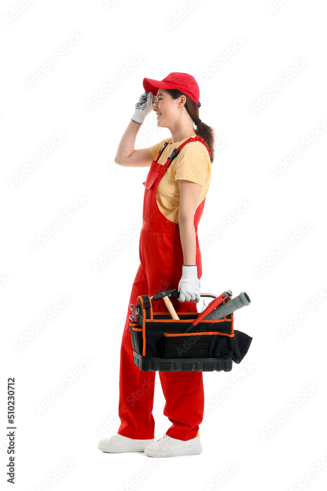 Asian female plumber holding bag with tools on white background