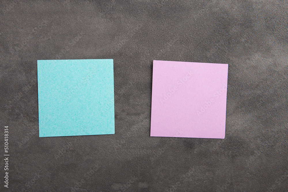 Colorful sticky notes on the blank blackboard