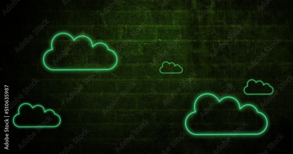 Digital composite image of green cloud shaped neon lights on wall, copy space