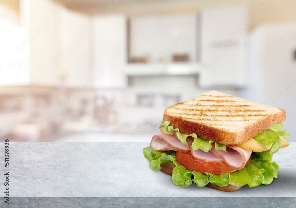 sandwich with ham, cucumber and cheese, food concept