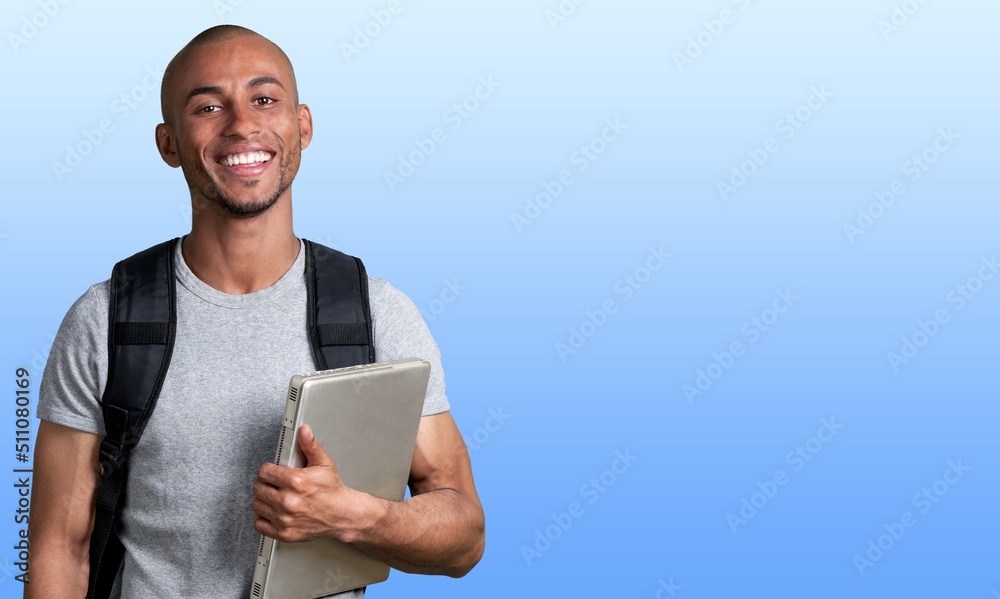 Shocked impressed surprised young man student coder programmer having idea, using laptop for remote 