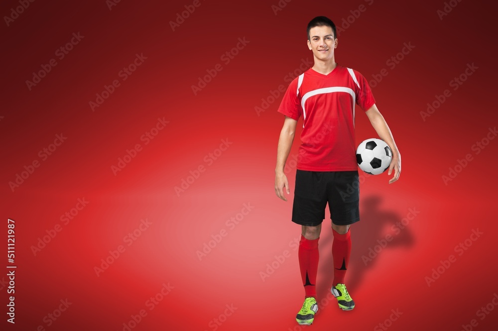 Happy young man football fan support favorite team hold soccer ball