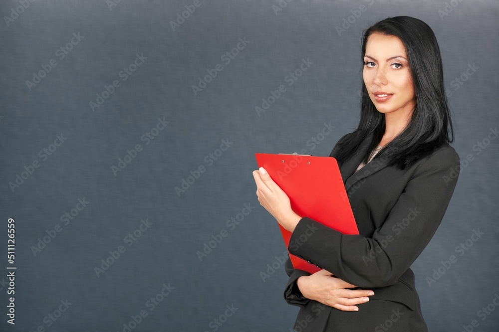 Portrait of smiling young woman waitress. Successful small business owner standing