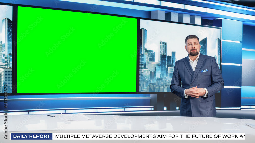 Talk Show TV Program: Handsome White Male Presenter Standing in Newsroom Studio, Uses Big Green Chro