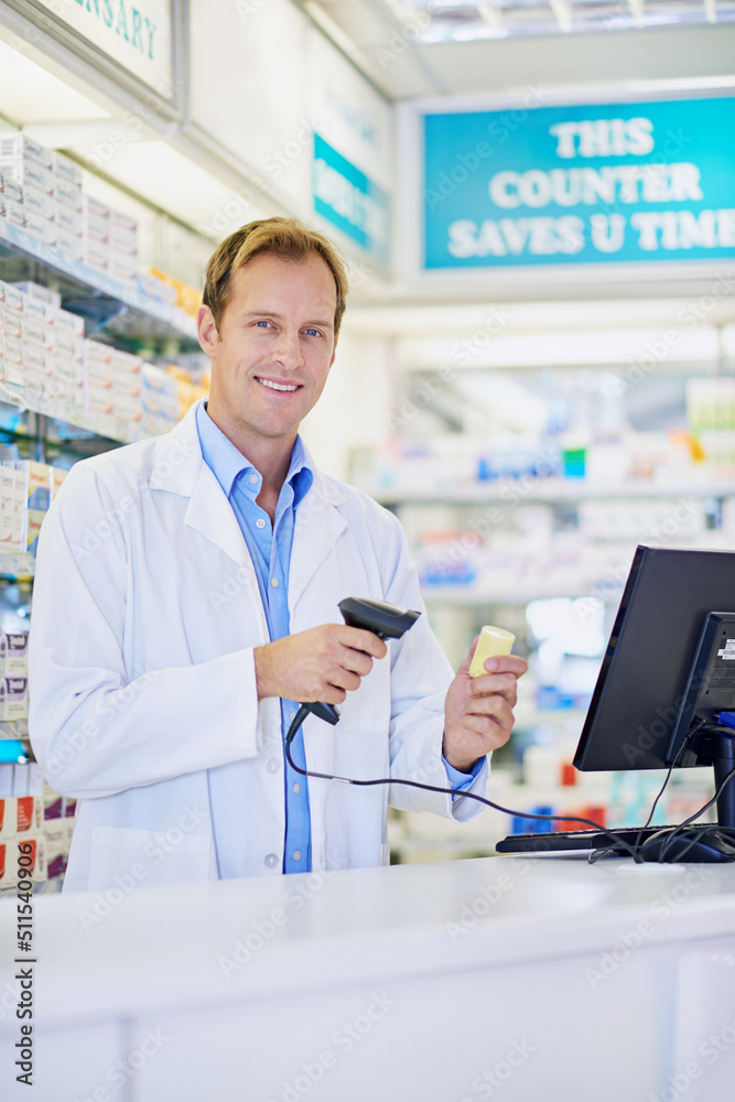 Technology makes everything easier. A pharmacist scanning the price on a bottle of pills.