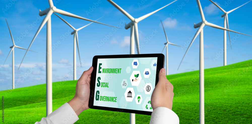 Green business transformation for environment saving and ESG business concept. Businessman using tab