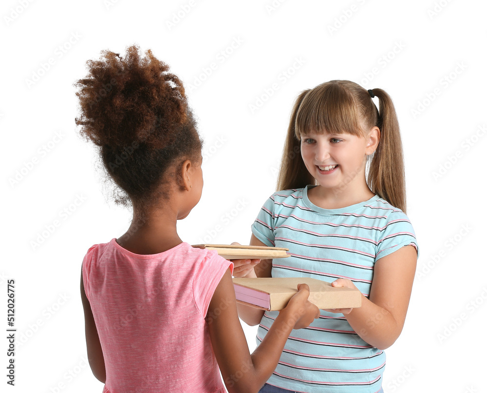 Little girls exchanging books on white background