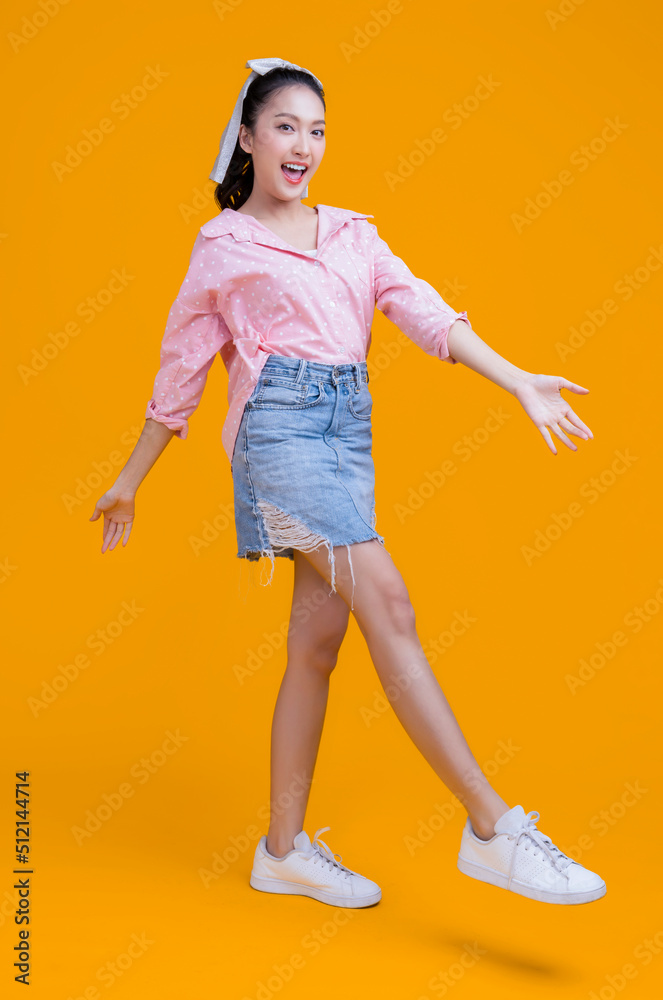 casual happiness asian female woman smiling cheerful in pink shirt blue jean relax peaceful positive