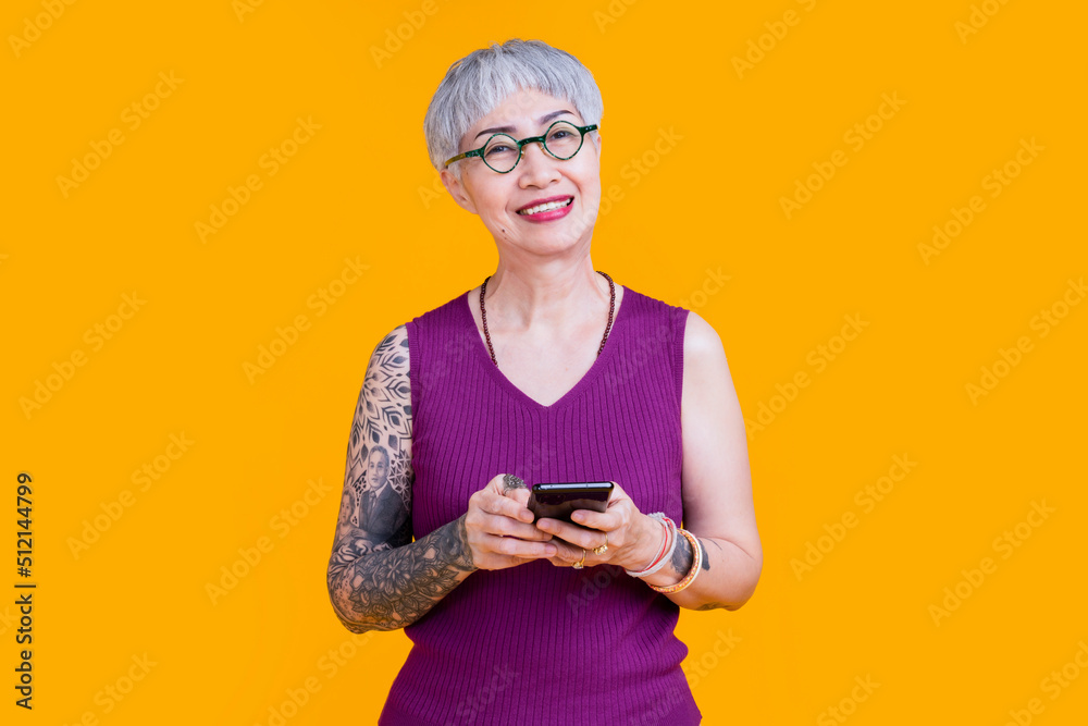 old senior asian mature adult female woman tattoo and glasses silver hair casual cloth business owne