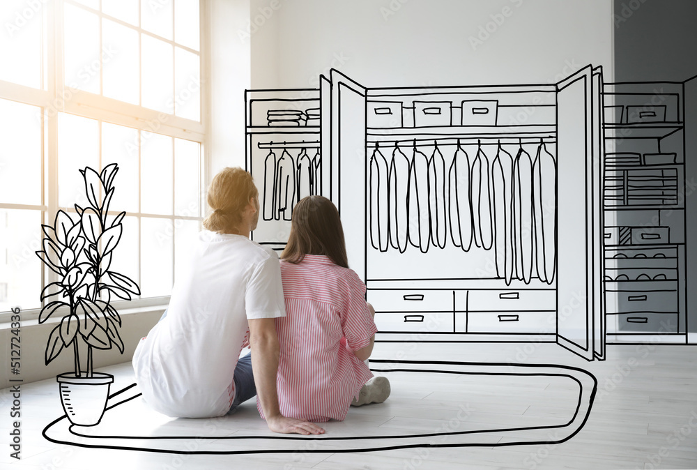 Young couple thinking about design of their new flat