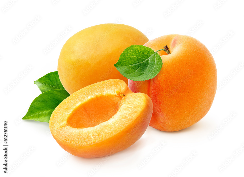 Apricot fruit with half of apricot and apricot kernel isolated on white background.