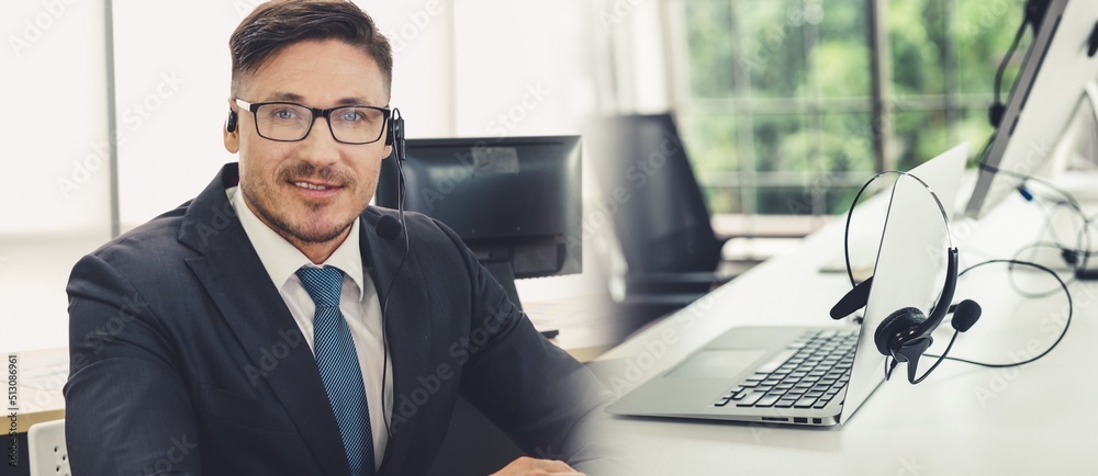 Business people wearing headset working in office to support remote customer or colleague. Call cent