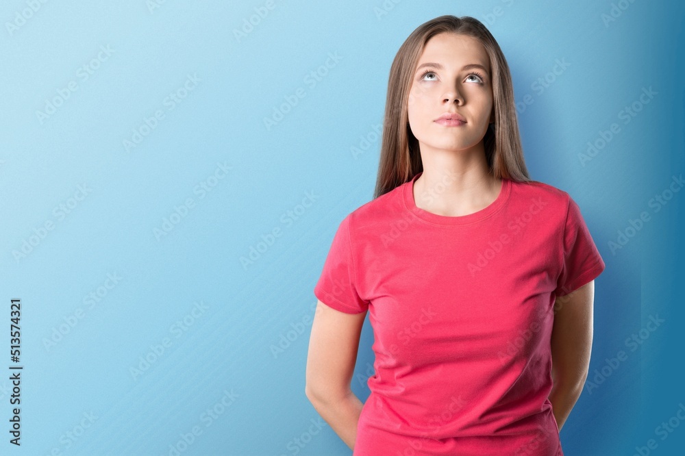 Photo of positive charming young girl posing