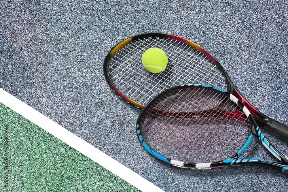 Pickleball Paddle and ball of court background.