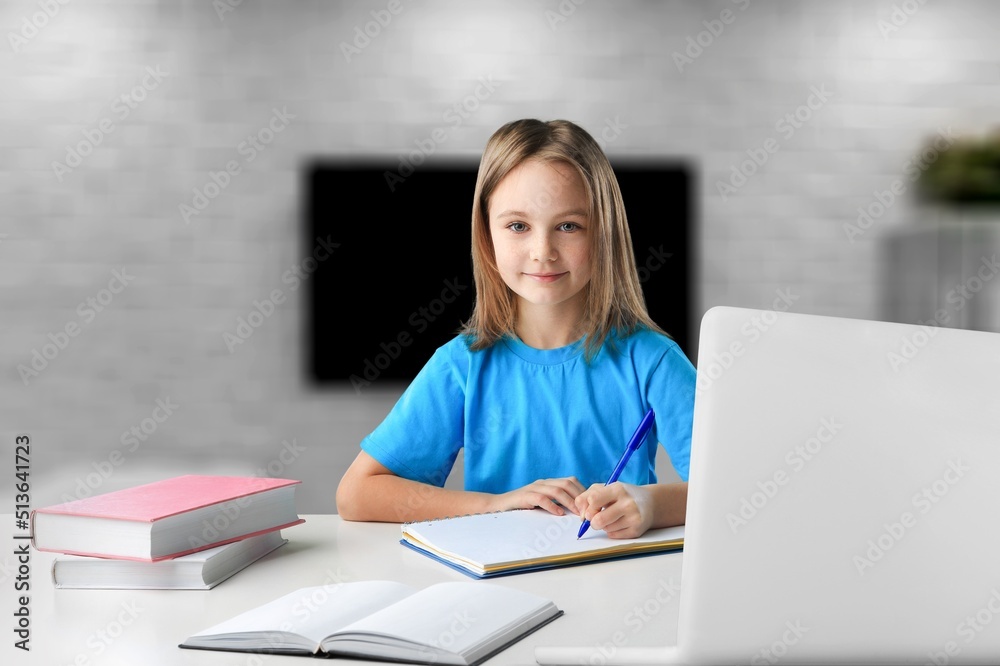 Junior high school students studying at home with books