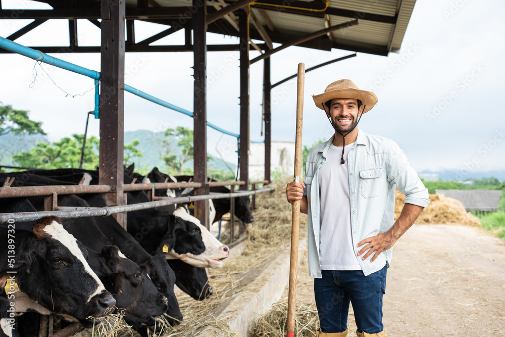 Portrait of Caucasian male dairy farmer working alone outdoors in farm