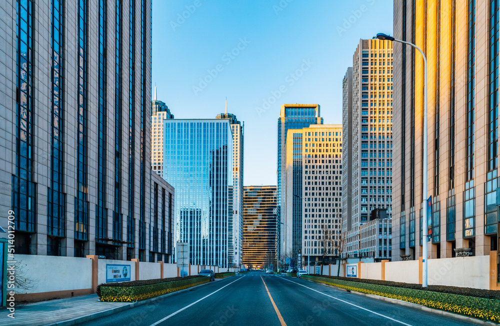 Urban skyscrapers under blue skies