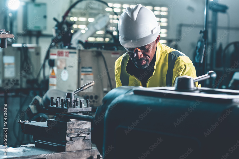 Factory worker or engineer do machine job in adept manufacturing workshop . Industrial people and ma