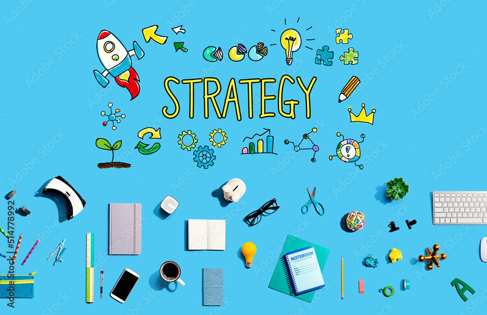 Strategy with collection of electronic gadgets and office supplies