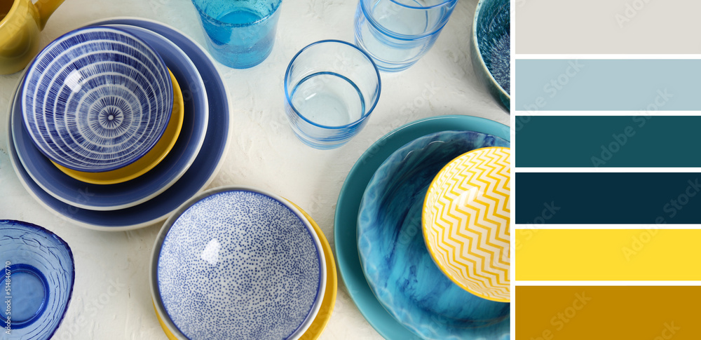 Set of dinnerware on light background. Different color patterns