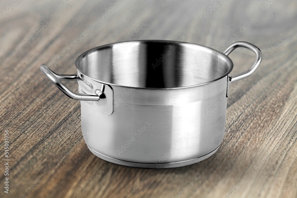 Classic steel pan with a non-stick coating on the desk