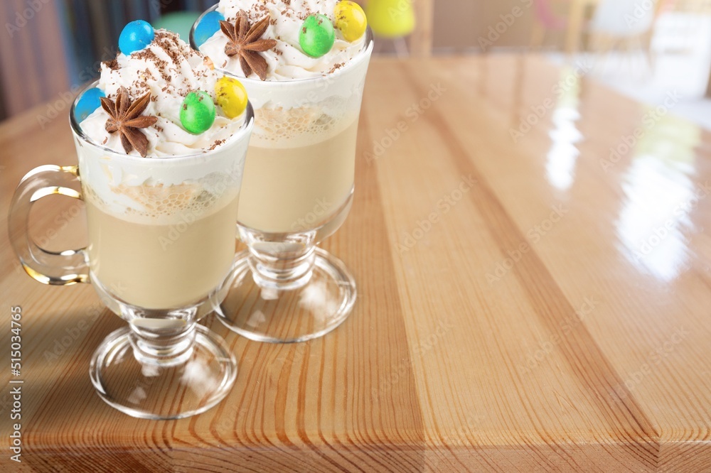 Crazy milk shake with ice cream, whipped cream in glass. Sweet dessert