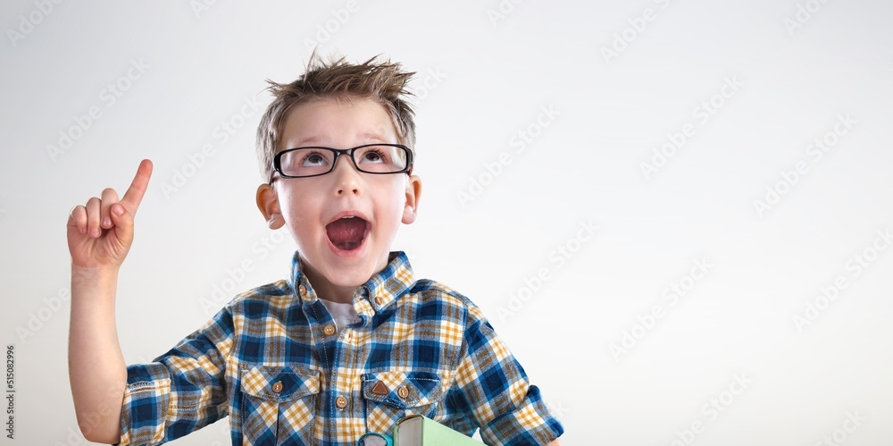 Child smiling happy student keeps pointing finger, Portrait little children boy preschool, Back to s