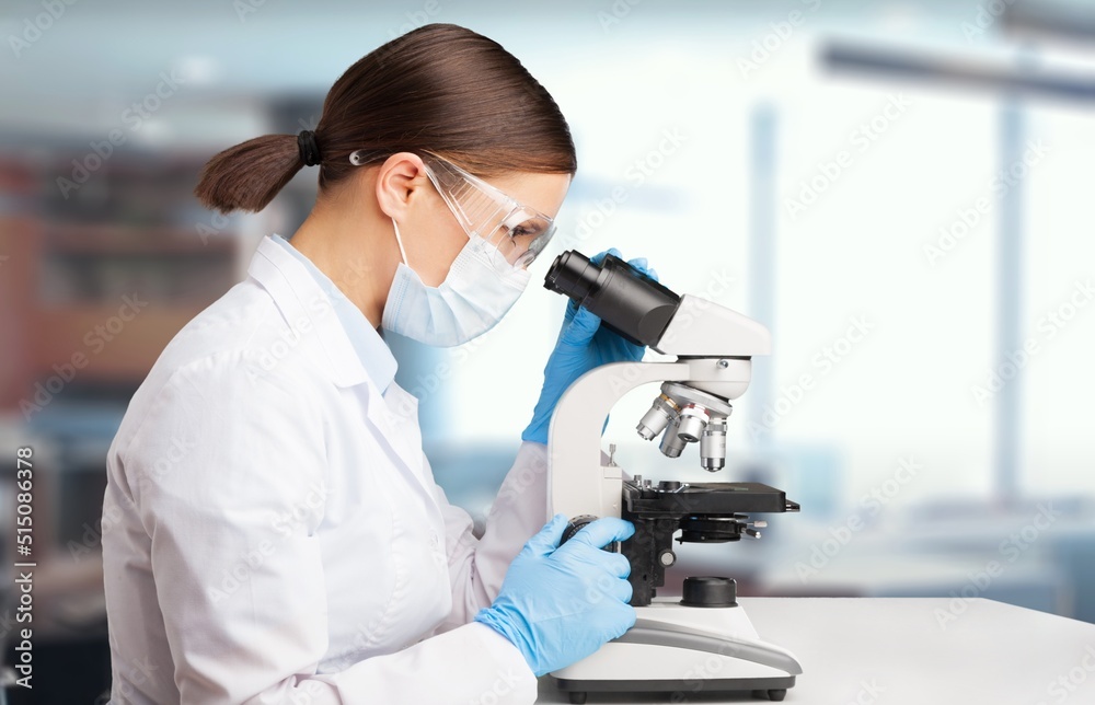 Female young Scientist Working in The Lab