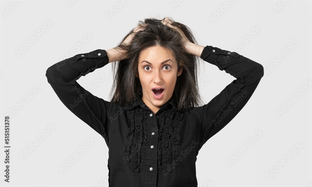 Image of shocked anxious woman in panic, worrying, standing frustrated and scared