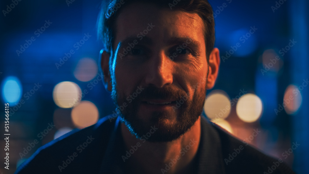 Portrait of Handsome Man Spending Time at Home, Resting on a Couch, Switching Channels on TV with Re